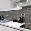 Midnight Montage Porcelain Tile  